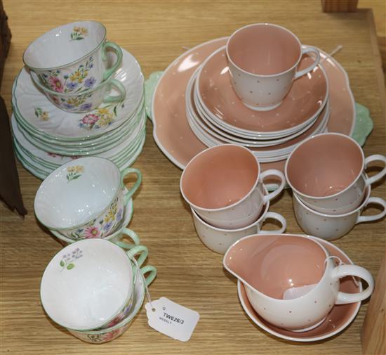A Shelley Wild Flowers tea service (19 pieces) and a Susie Cooper part spotted pink and white tea service (18 pieces)